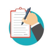 Auto-Checklist Hand filling out business compliance checklist