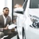 insurance inspector inspecting a car