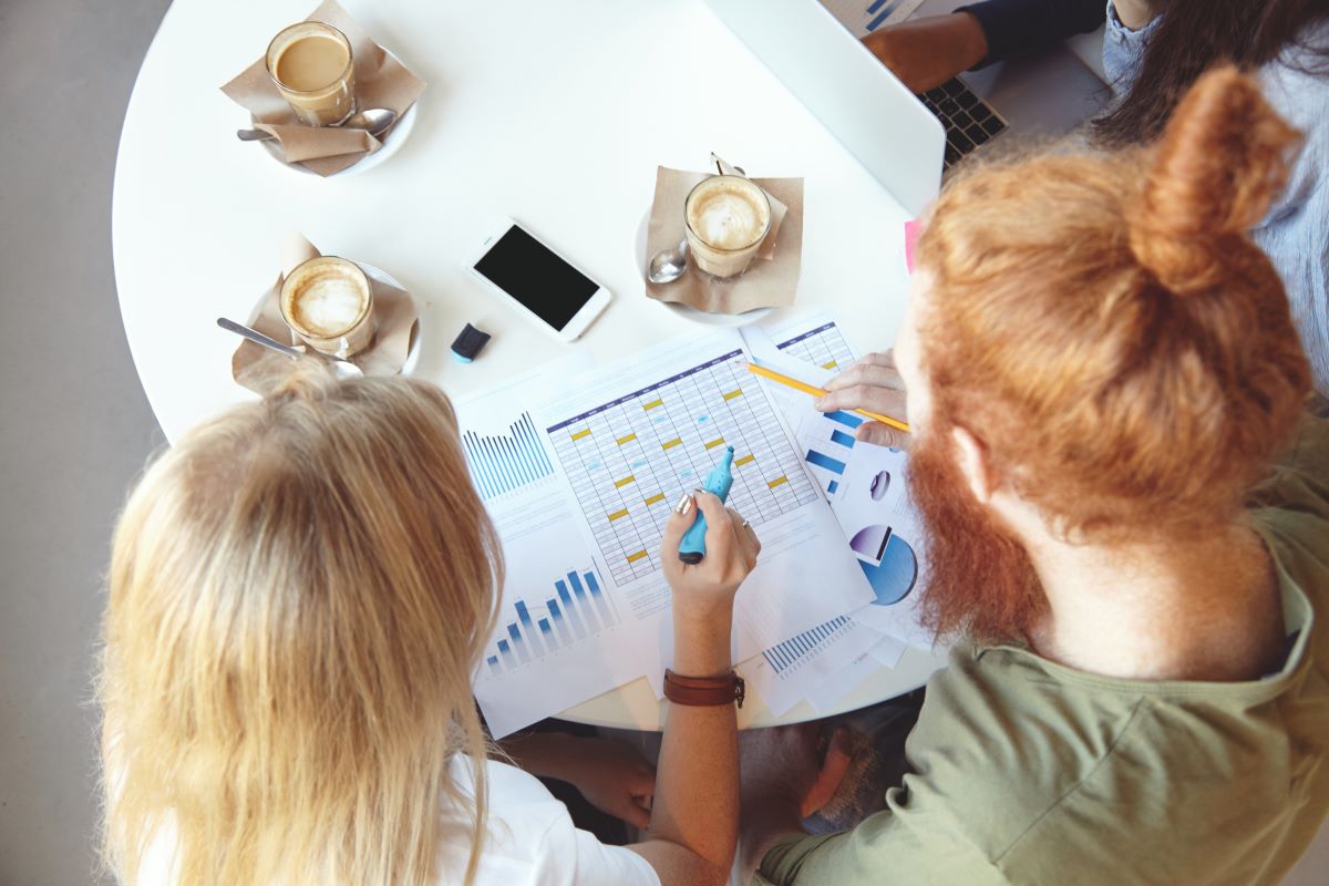 Team reviewing content strategy during business meeting