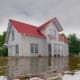 an image of a house surrounded by water due to a flood