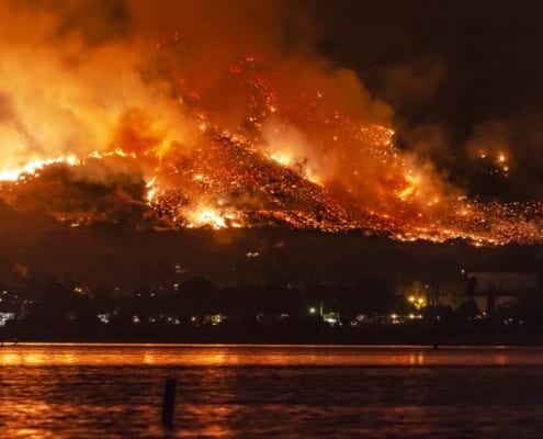 a fire spreading across mountains