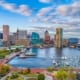 maryland Inner Harbor skyline with waterfront marina and city buildings