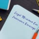 a notebook with legal minimum car insurance coverage written on it