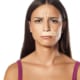 a woman with a band aid on her upper lip