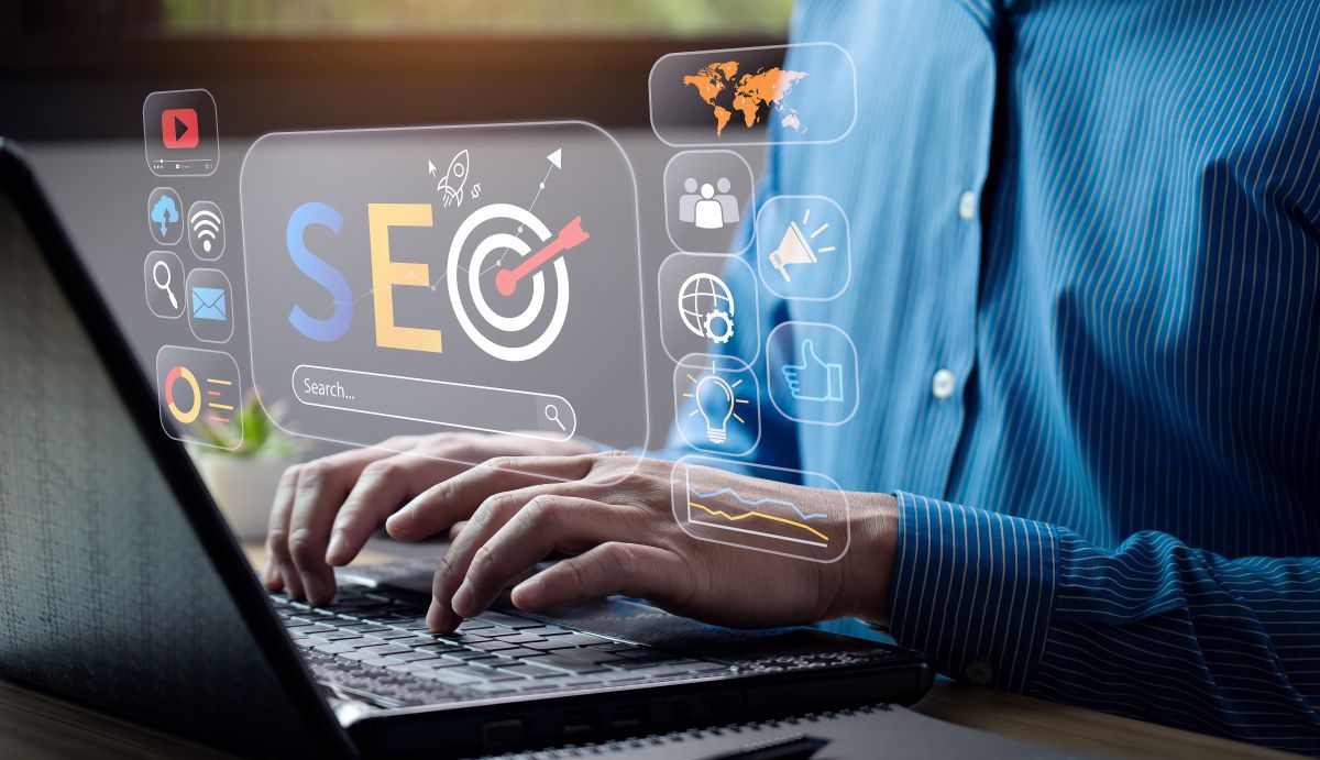 Business professional analyzing SEO strategy and search rankings on laptop