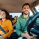 a family driving in their car
