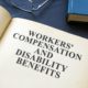 a book with work compensation and disability benefits written on the page